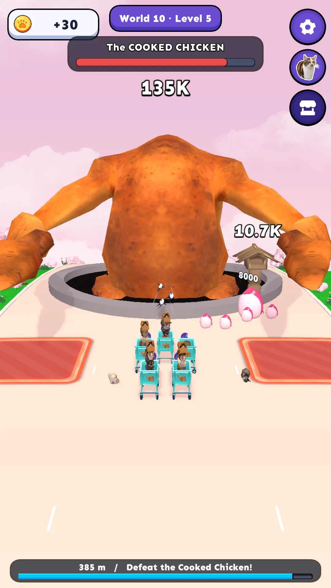 The cat army firing fish at the giant Cooked Chicken boss
